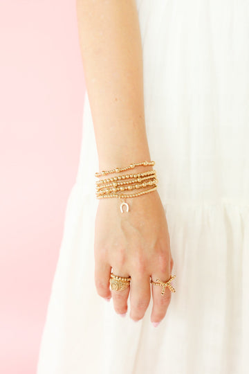 Horseshoe Gold Charm Bracelet